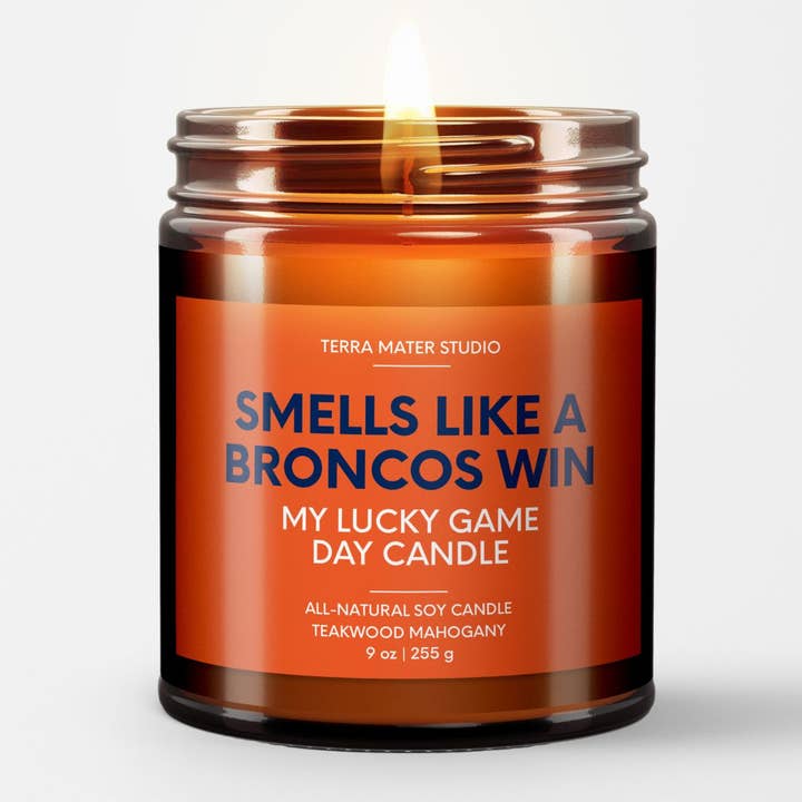 Smells Like A Broncos Win | Game Day Candle | Broncos Merch and other Purchase Wholesale refrescos. Free Returns & Net 60 Terms on Faire trending on Faire.