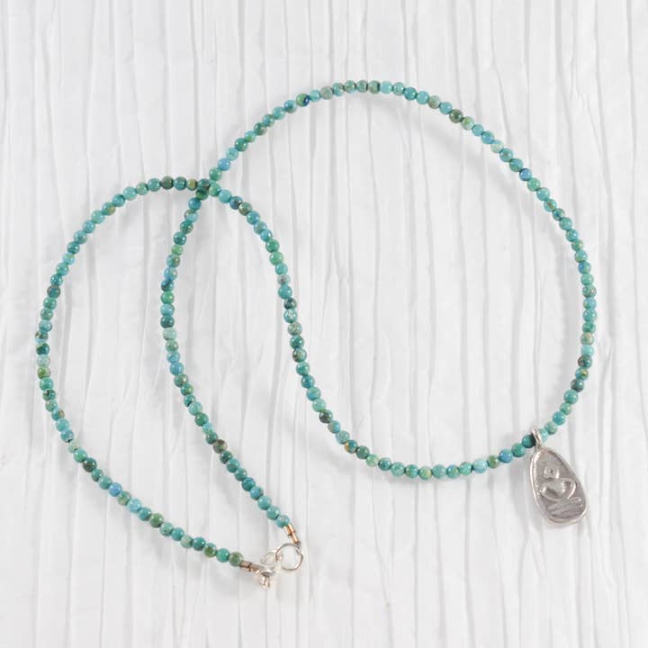 Turquoise Necklace with Sitting Lotus Charm for wholesale by Marsha Marsha Jewelry