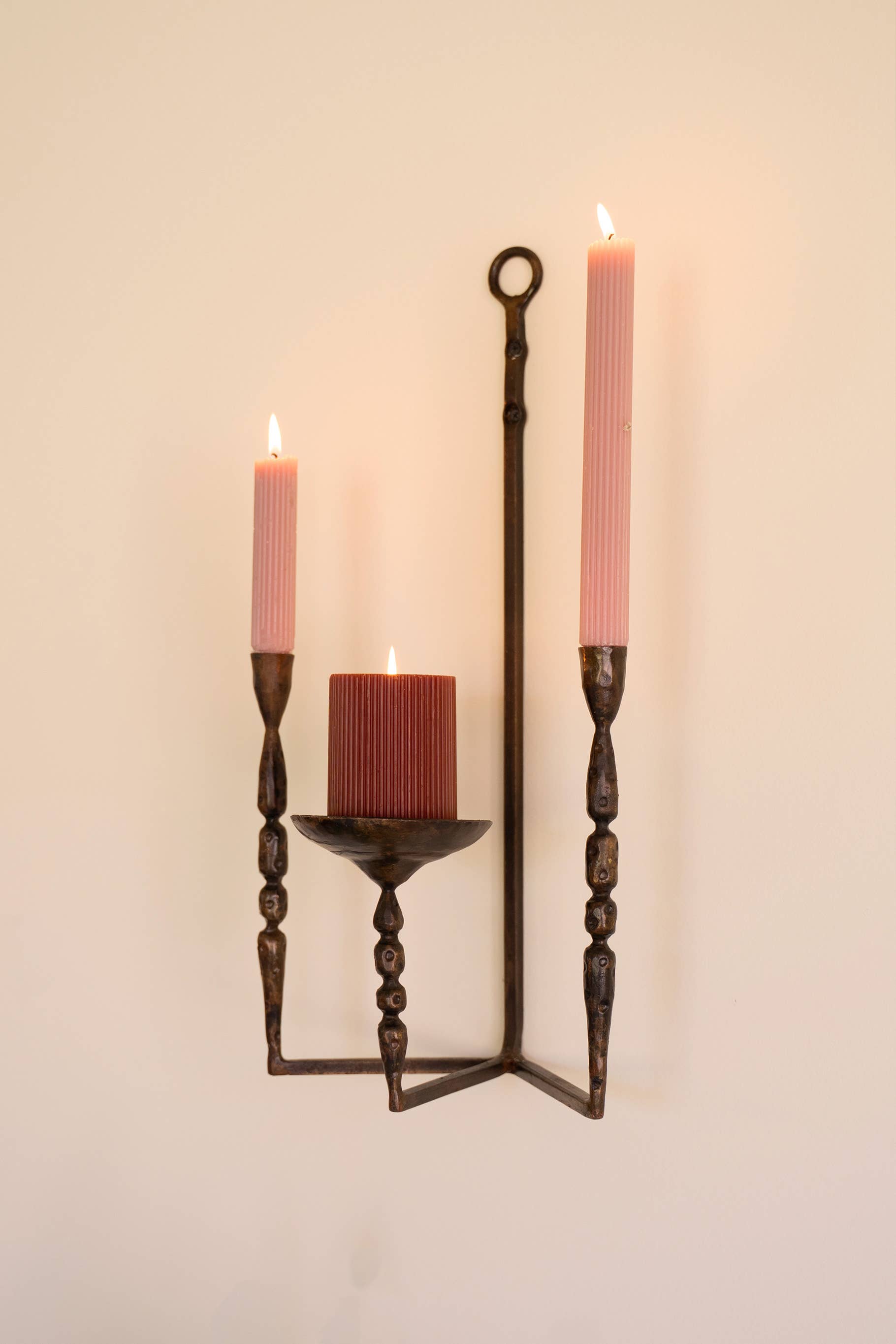 Brown FORGED IRON WALL TAPER AND PILLAR CANDLE HOLDER for wholesale on Faire4
