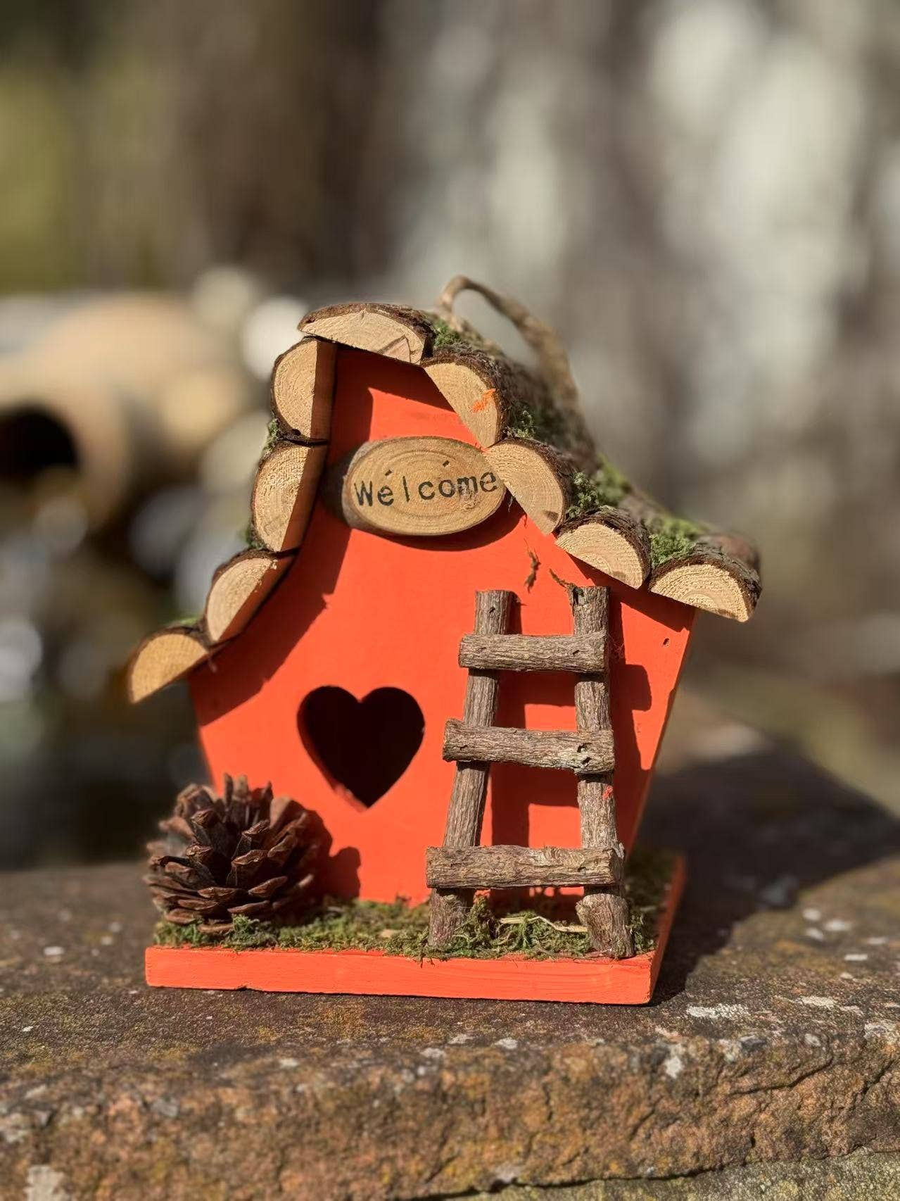 Marissa's Gifts - Wholesale Bird House - Handmade wooden coloured birdhouse hut with adorable heart shaped bird hole and ladder. The measurements are 17 x 11.5 x 17cm10