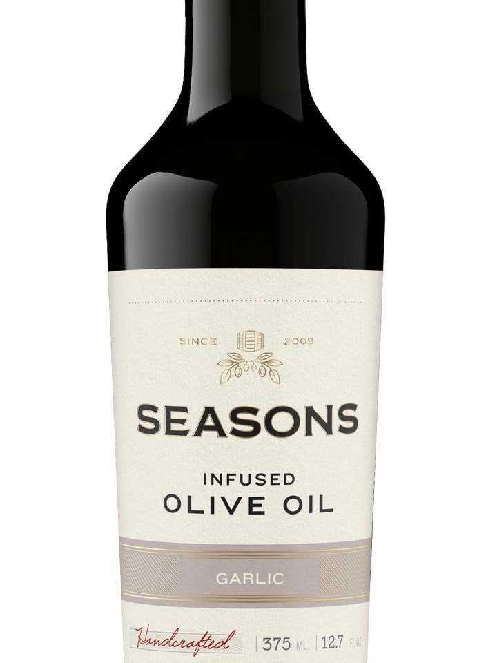 Garlic Infused Olive Oil for wholesale by Seasons Olive Oil & Vinegar Taproom