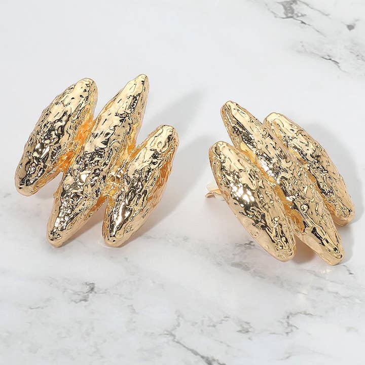 Textured Sculptural Metal Clip On Earrings for wholesale by Sensibling Corp.