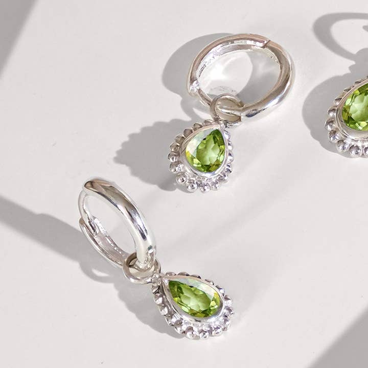 August Birthstone Huggie Hoops - Peridot for wholesale by Charlotte's Web Jewellery
