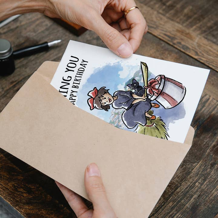 Aaron Millard Illustration - Wholesale Birthday Card - "Witching You" Young Witch Broom Anime Birthday Card