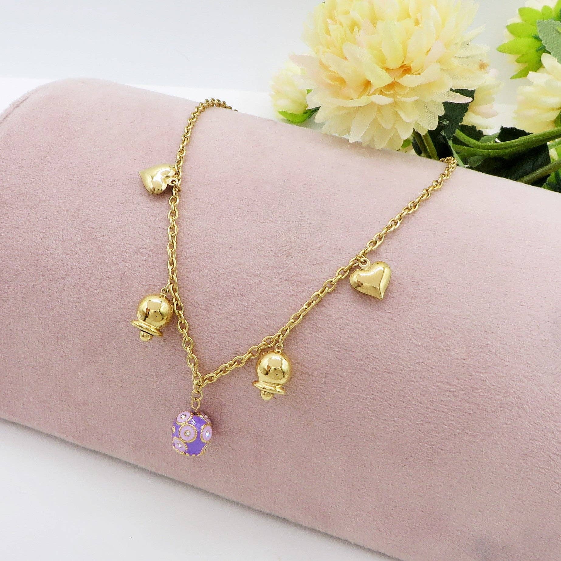 LILLA ORO ROSABELL - ACCIAIO INOSSIDABILE- Collana con campanella e cuori bombe' chiama angeli for wholesale on Faire1