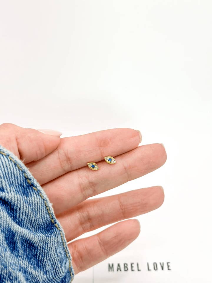 Tiny Eye Stud Gold Earrings for wholesale by MABEL LOVE CO