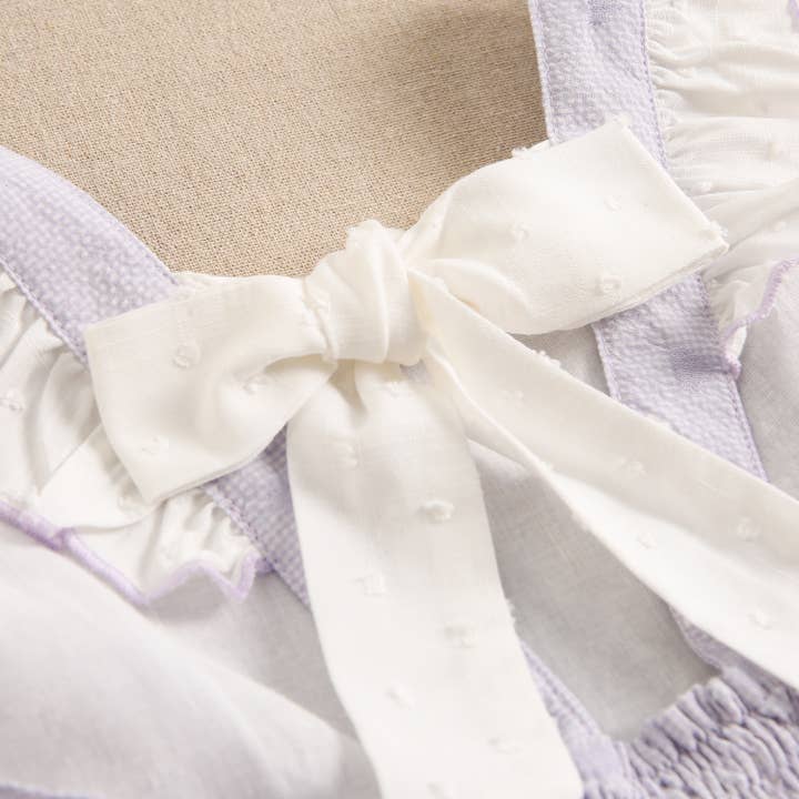 Lila Jumpsuit för flicka med hjärtan och volanger för wholesale på Faire4