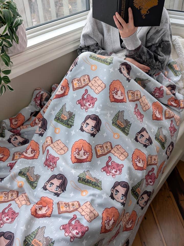 Odessa and Ransom Chibi Sherpa Fleece Blanket | Shield of Sparrows for wholesale by Narrative Threads