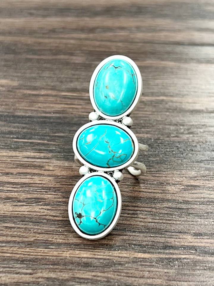 750433, Anillo Ajustable de Latón con Turquesa Navajo para venta al por mayor de ISAC Trading Inc