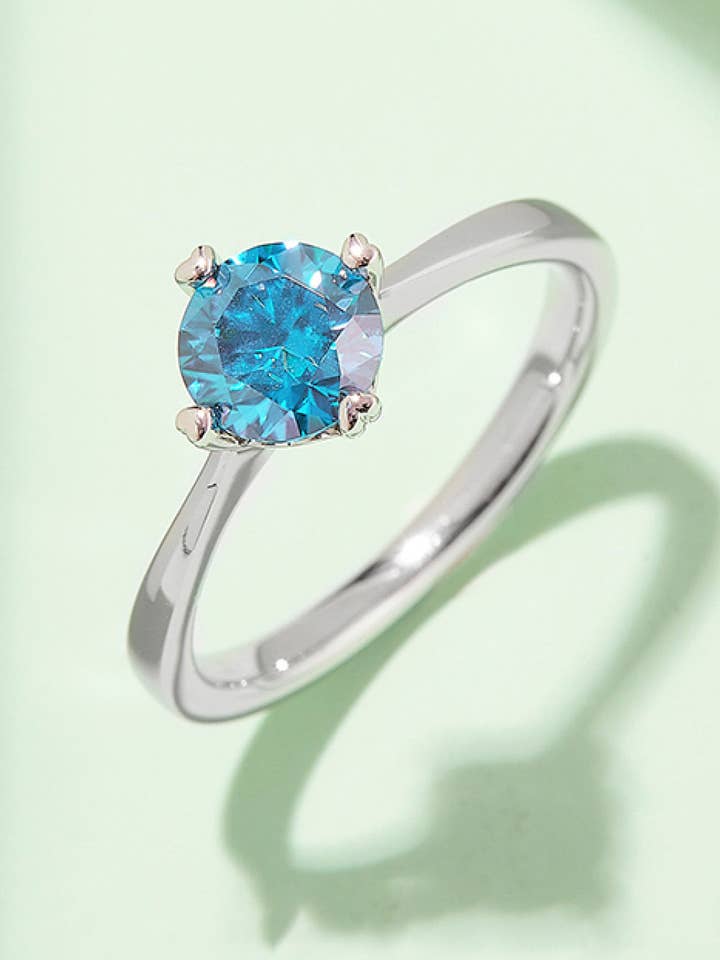 1 Carat Moissanite Platinum Over Pure Sterling Silver Solitaire Ring (Yellow, Pink, or Blue) for wholesale by Sparkala