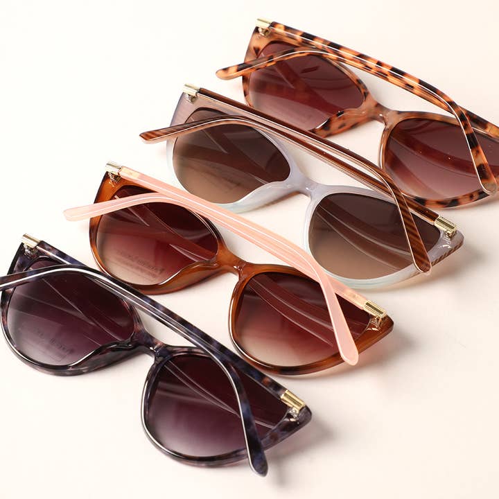 12 COLORI ASSORTITI Occhiali da sole a forma di triangolo Cat Eye con montatura in vendita all'ingrosso su Faire2