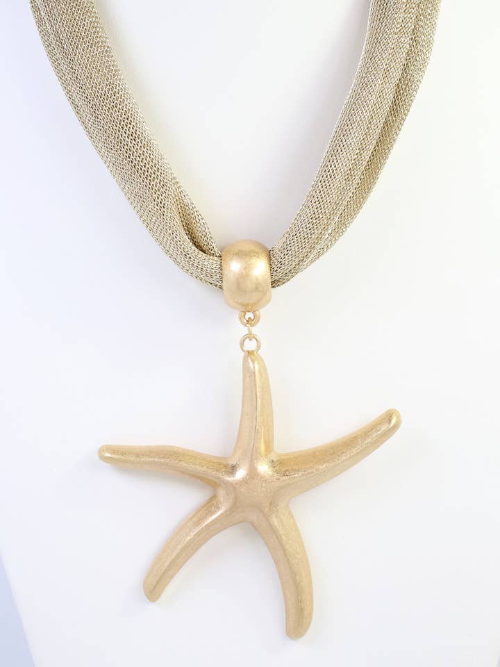 Maitland Mesh Starfish Necklace Worn Gold for wholesale by Caroline Hill