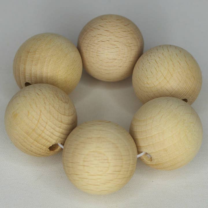 Braccialetto di sfere in legno di faggio per la vendita all'ingrosso da parte di ENROSCA