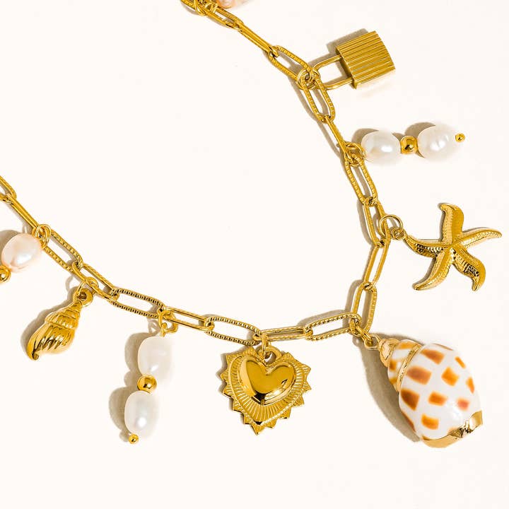 Ophélie 18K Gold Non-Tarnish Shell and Pearl Charm Necklace for wholesale on Faire
