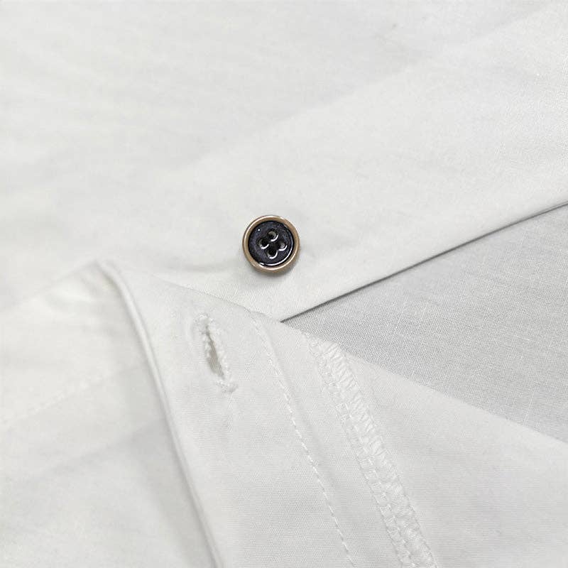 VIT Asymmetrisk blus med knappar och delad framkant för wholesale på Faire9