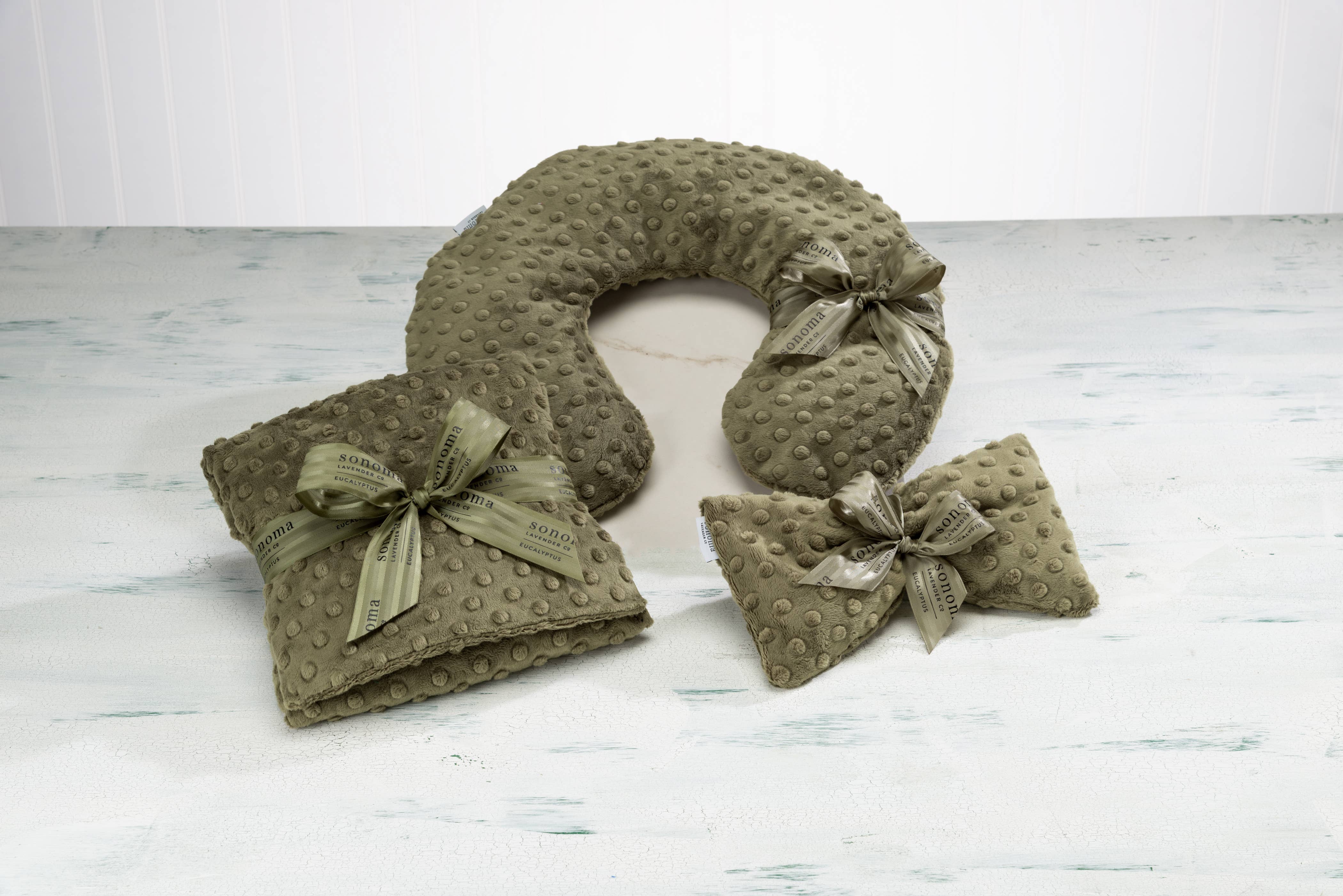 Multi Colored Neck Pillow - Eucalyptus Green Dot for wholesale on Faire1