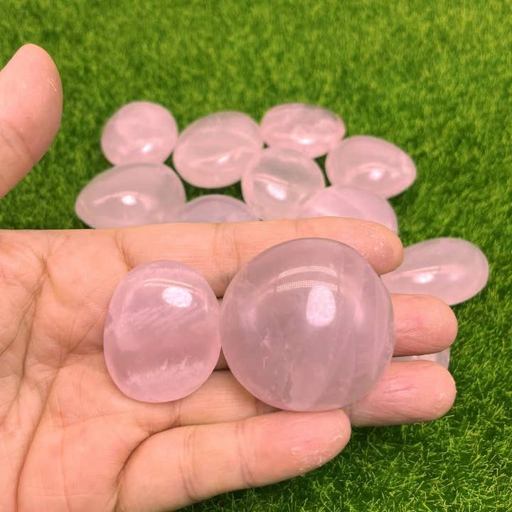 Rose Quartz Palm Stones from Madagascar, 2 Sizes for wholesale by Crystal Deal· Wholesale Crystals & Gifts