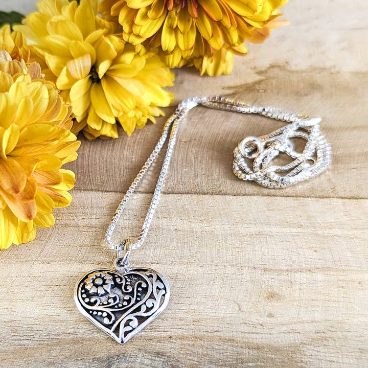 Floral Design Heart Pendant in Sterling Silver for wholesale by The Green Gecko