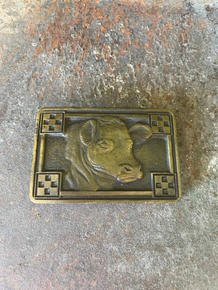 Vintage Purina Cow Buckle for wholesale by Back Forty Rural Apparel & Goods