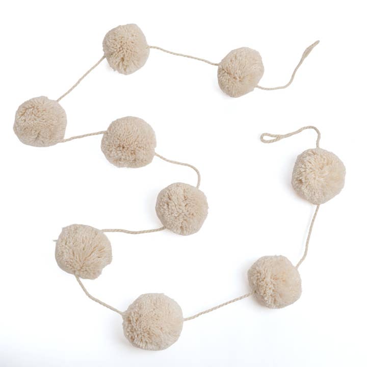 Cream Pom Pom Garland for wholesale by Sugarboo & Co