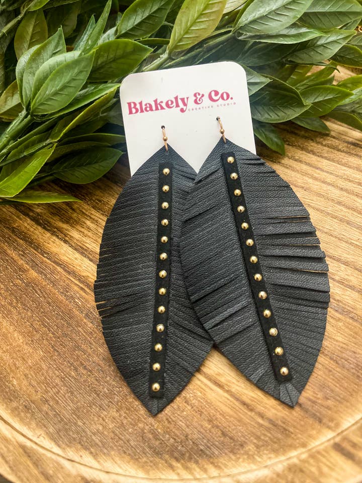Black Studded Feather Faux Leather Earrings for wholesale by Blakely and Co.