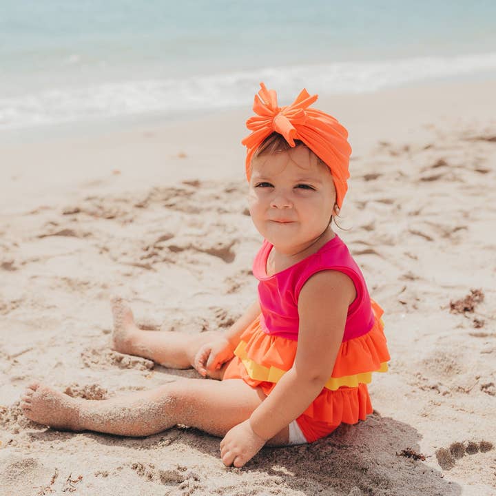 UPF Orange Swim Bow Turban for wholesale by Sweet Peas Co