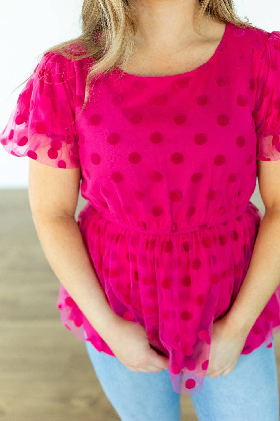 Pink Polka Dot Mesh Peplum Top for wholesale on Faire11