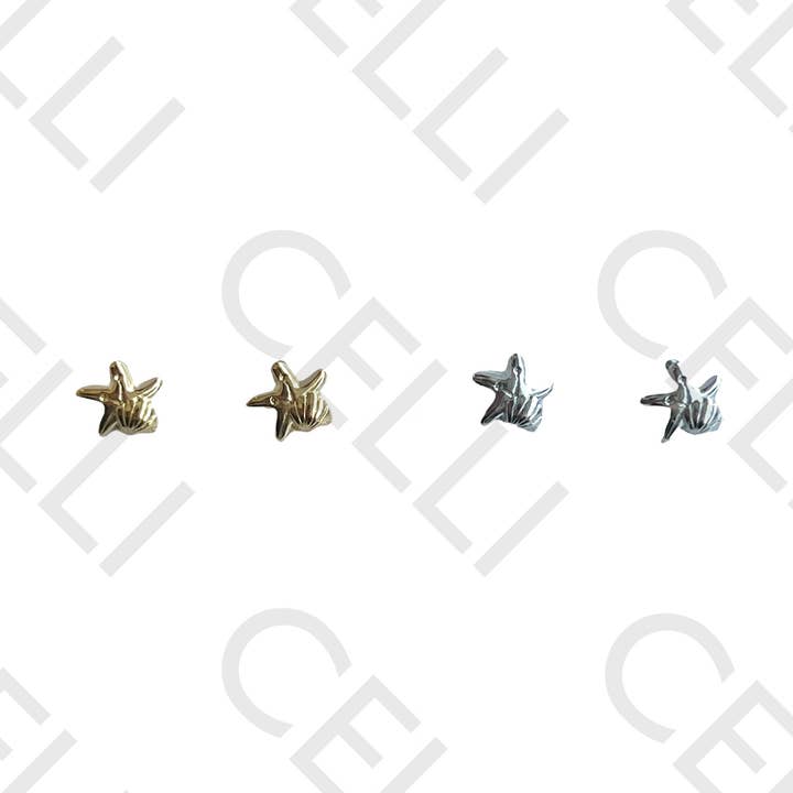 Stalen oorbel - mini zeester en schelp voor wholesale door Celli Biju