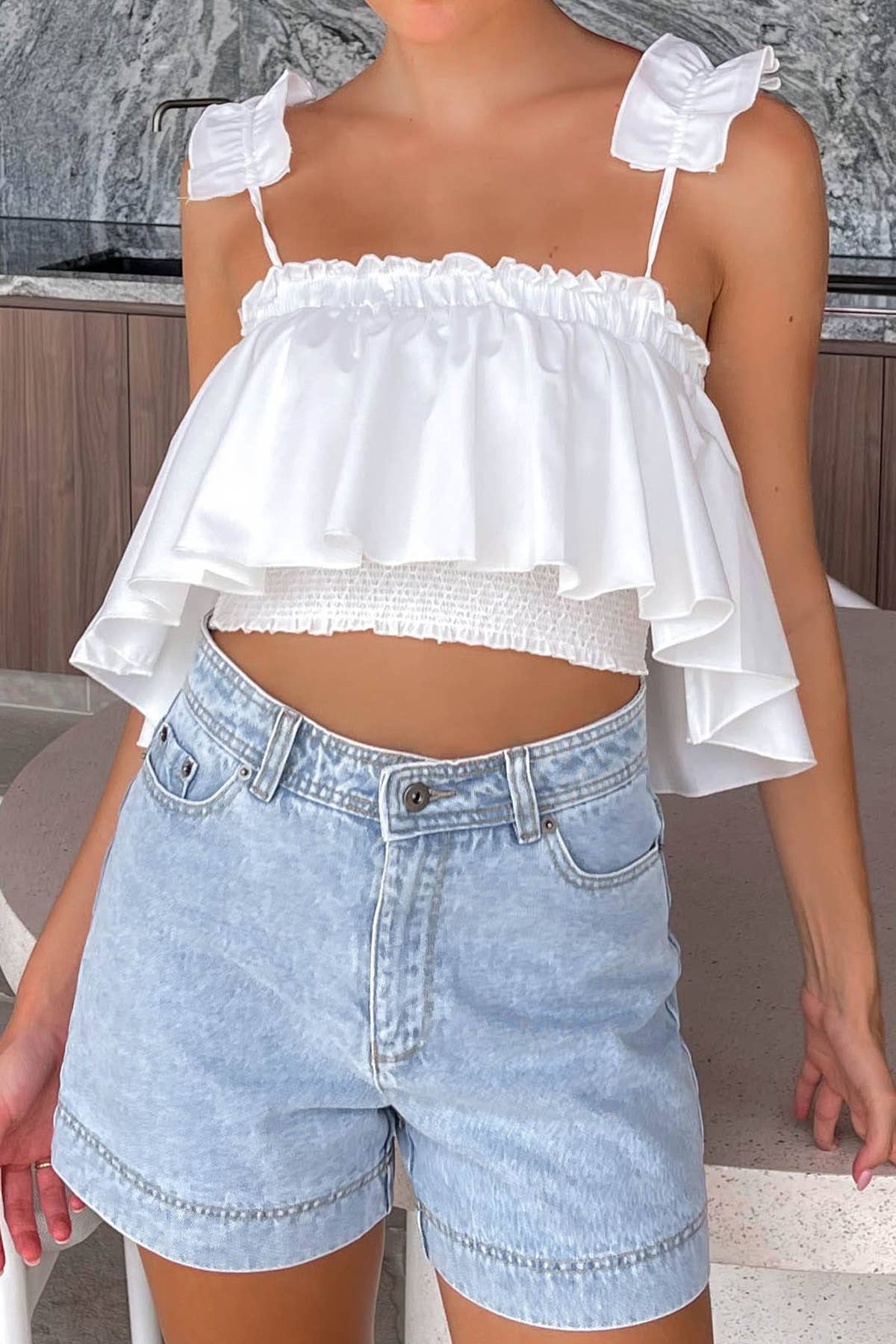 BRANCO T2023ES0016- Top sem mangas sem folho branco cropped para venda a revendedores na Faire0