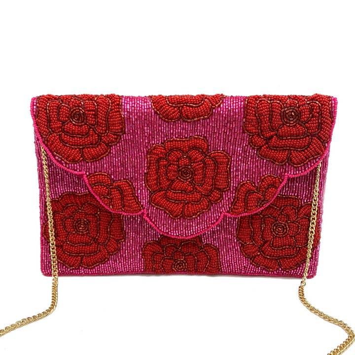 FUCHSIA WITH RED ROSES BEADED CLUTCH for wholesale by Pizzazz, Inc.