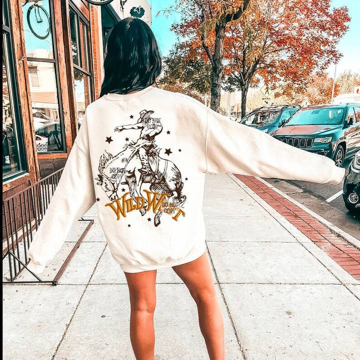 T-Shirt Sweatshirt Hoodie Wild West Cowboy Rodeo Bronco Rider Design Crewneck for wholesale by STRONG N FREE CDN