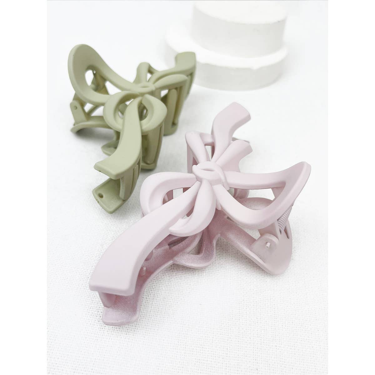 MIX COLOR Knotted Bow Soft Tone Matte Hair Claw for wholesale on Faire3
