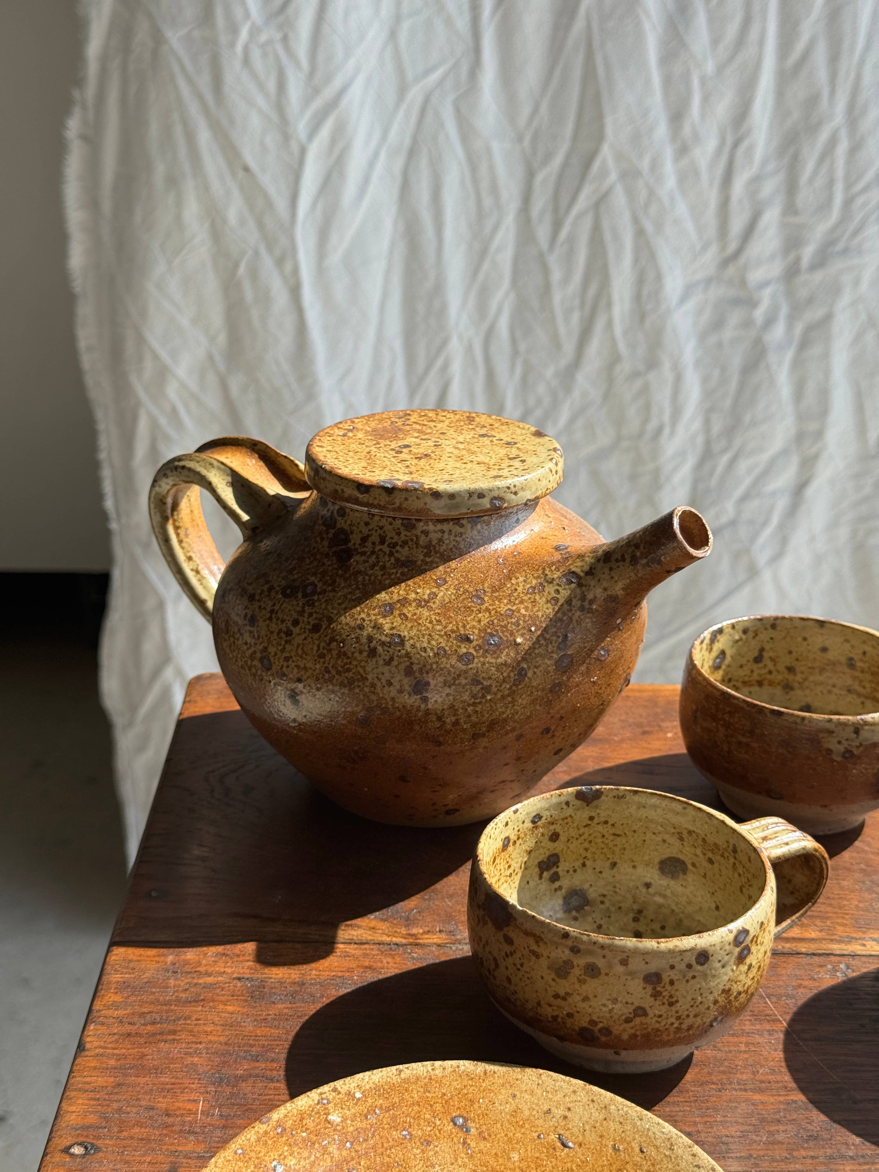 brown Small stoneware tea set with teapot, cups, sugar bowl for wholesale on Faire8
