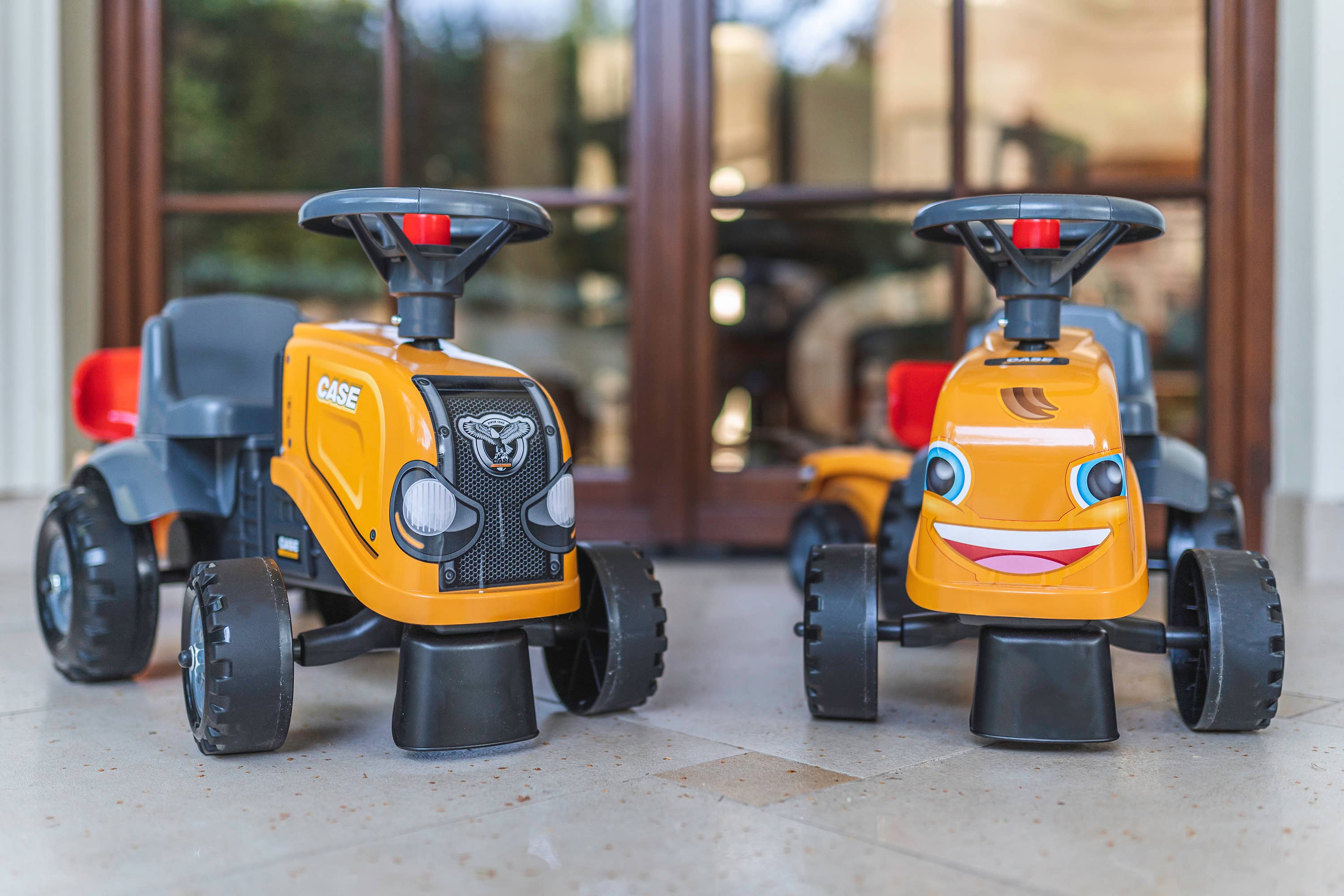 American Hobbies & Merchandising - Wholesale Bike/Scooter - Kids - Case CE Tractor with Trailer & Access, Push Ride-on 1-3 Y4