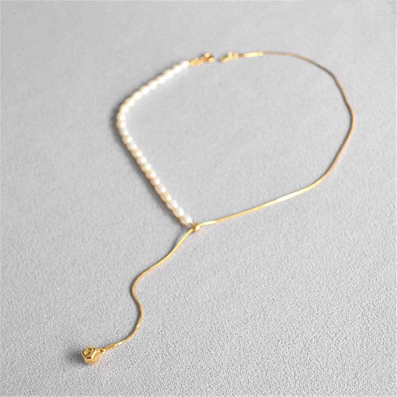 Revelari - Wholesale Pendant/Charm Necklace - Elegant Pearl and Gold Necklace with Pendant0