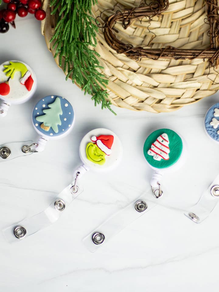 Feestdagen Badge Reels 2023 voor wholesale door EJ Clay Co