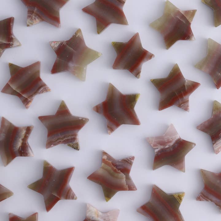 One Rose Calcite Little Star for wholesale by Mi Esperanza Minerals