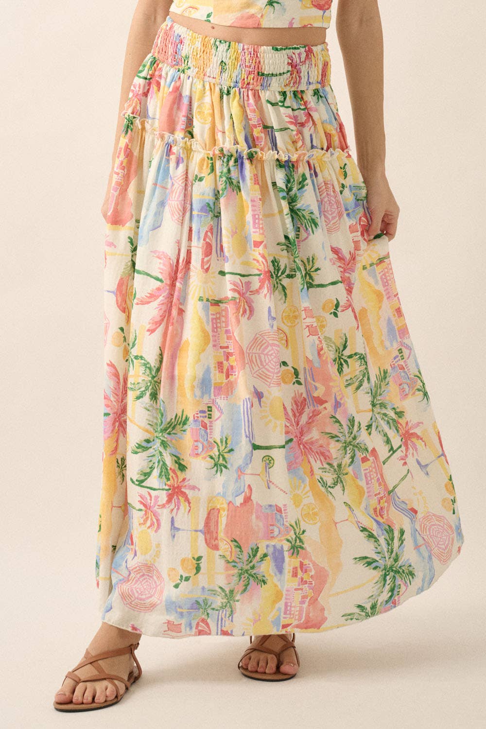 Crème Jupe longue smockée à imprimé aquarelle tropical. en vente sur Faire8