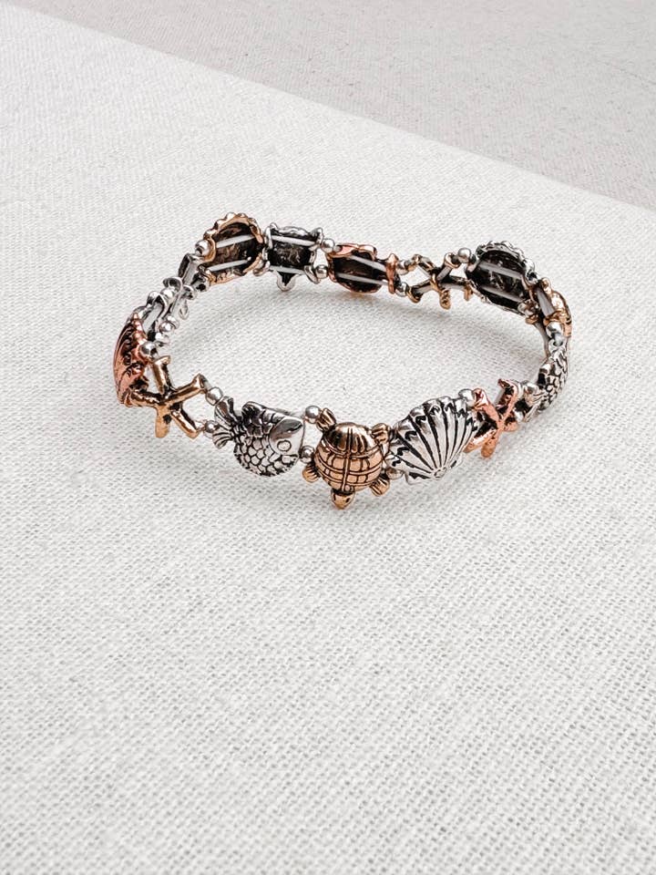 Pulsera elástica vintage de metales mixtos para verano, playa y vida marina para venta al por mayor de Juniper Wish