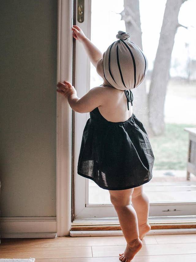 Black Solid Peplum for wholesale by The Baby Bird Boutique
