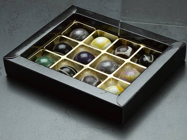 DW91 LLC - Wholesale Chocolate Bar - Carma - Swiss Top Milk Couverture 35% Block 2kg4