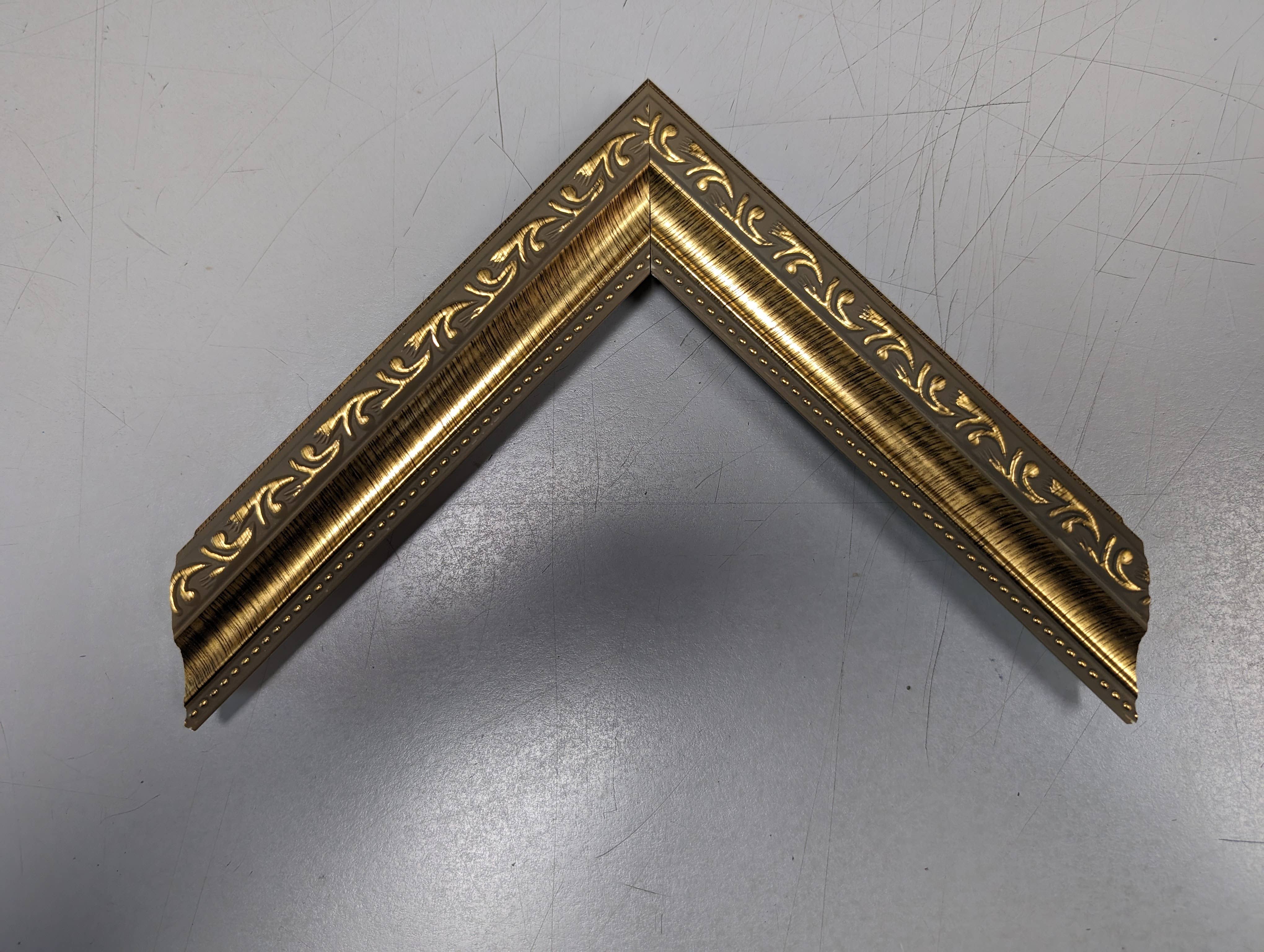West Coast Frames LLC - Wholesale Picture Frame - 1107 - 1-1/4" Gold Ornate Poly Picture Frame1