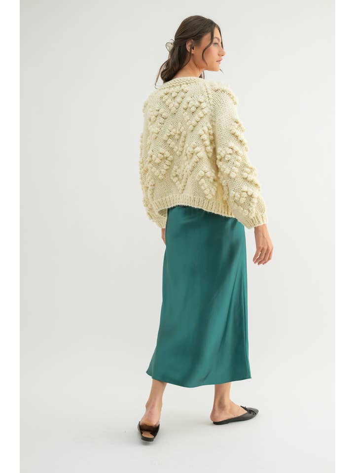 CREAM HAND-KNIT POM-POM HEART CARDIGAN / WL24-9723 for wholesale on Faire