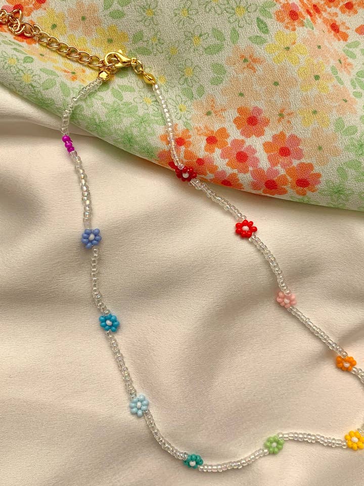 Clear Rainbow Daisy Chain Necklace for wholesale by Lil Things Shop
