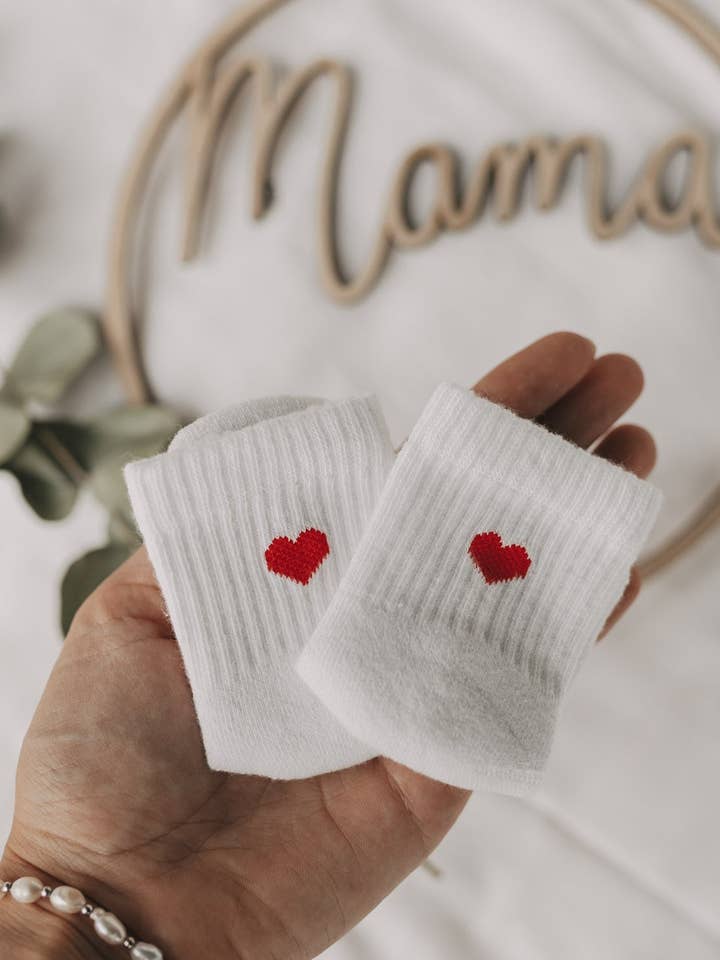 Baby socks heart red (PU = 5 pcs.) and other Purchase Wholesale heart socks. Free Returns & Net 60 Terms on Faire trending on Faire.