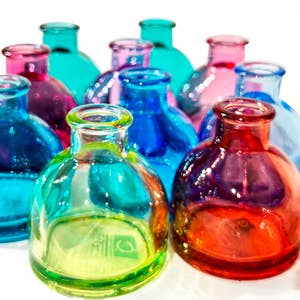 colored glass bottles  Colored glass bottles, Genie bottle, Large wine  glass