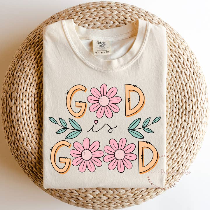 Maglietta grafica God Is Good per la vendita all'ingrosso da parte di Rebellious Rose LLC
