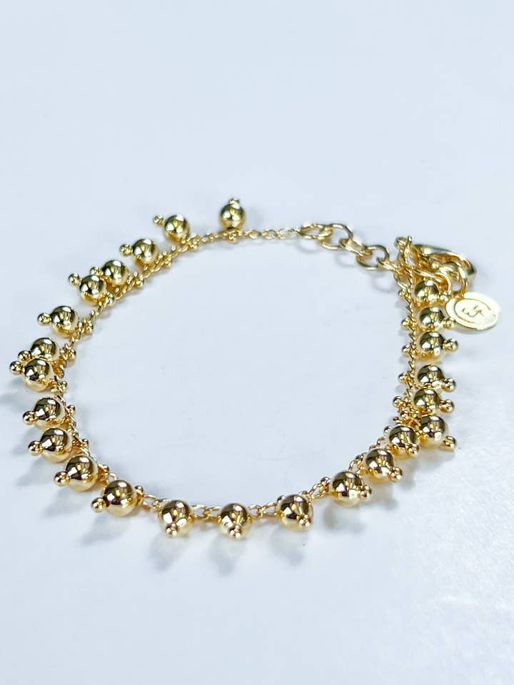 Gypsy Dangling Bead Bracelet for wholesale by We R Brand