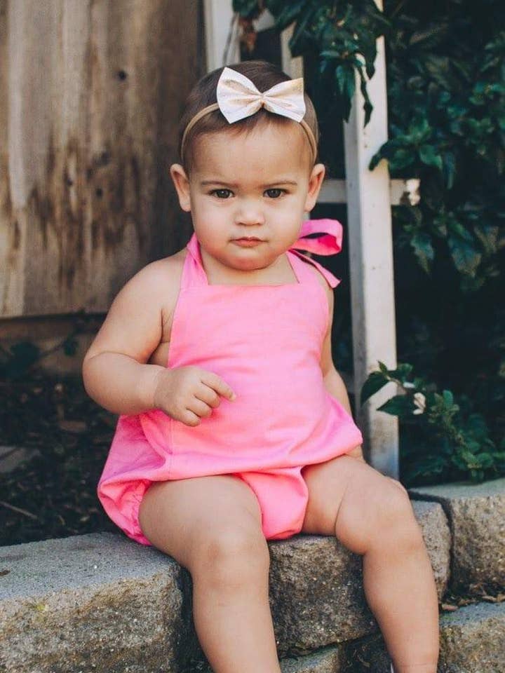 Bubble Gum Kole Romper for wholesale by The Baby Bird Boutique