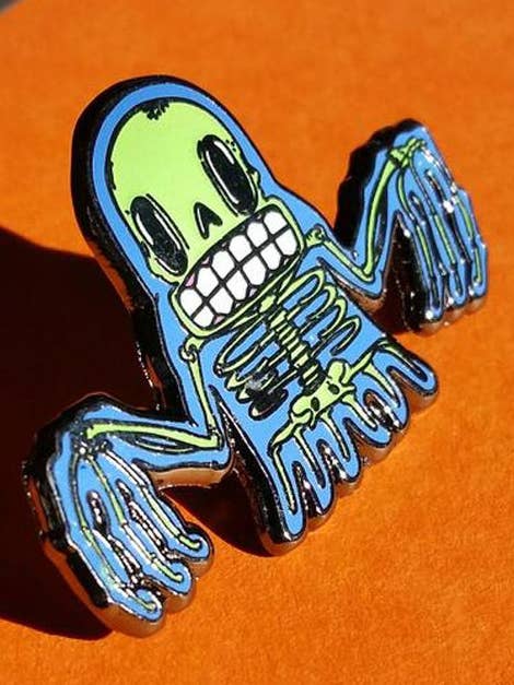 Skully Ghost Glow in the Dark Enamel Pin for wholesale by Goodies Ultra Fun Company